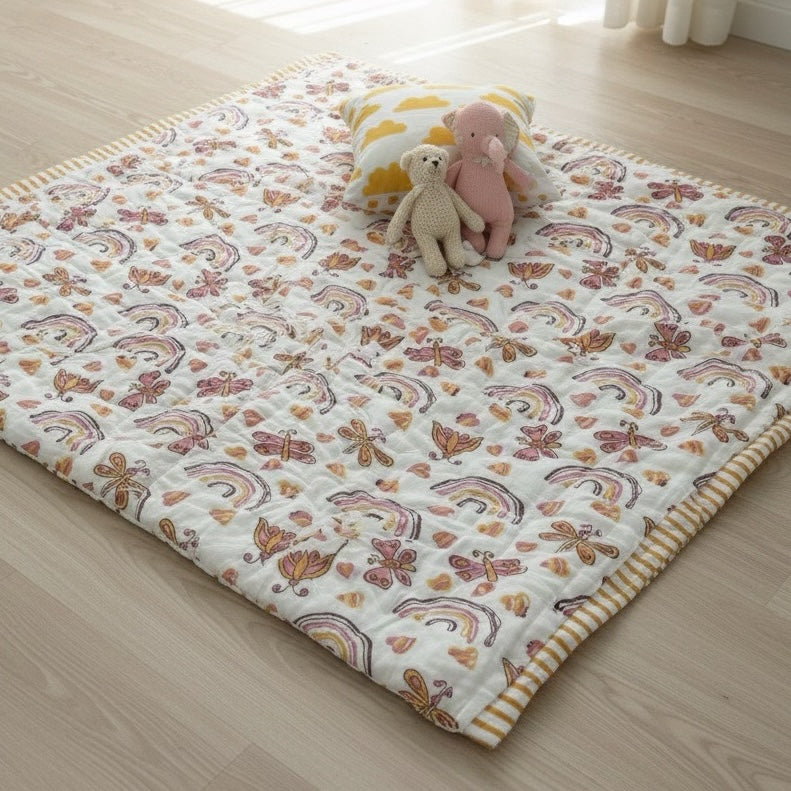 Rainbow Meadow print hand block-printed reversible cotton voile kids quilt (razai) – lifestyle - bed