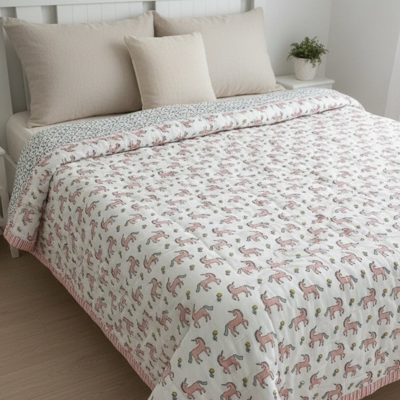 Blush Pony print hand block-printed reversible cotton voile kids quilt (razai) – hero/folded