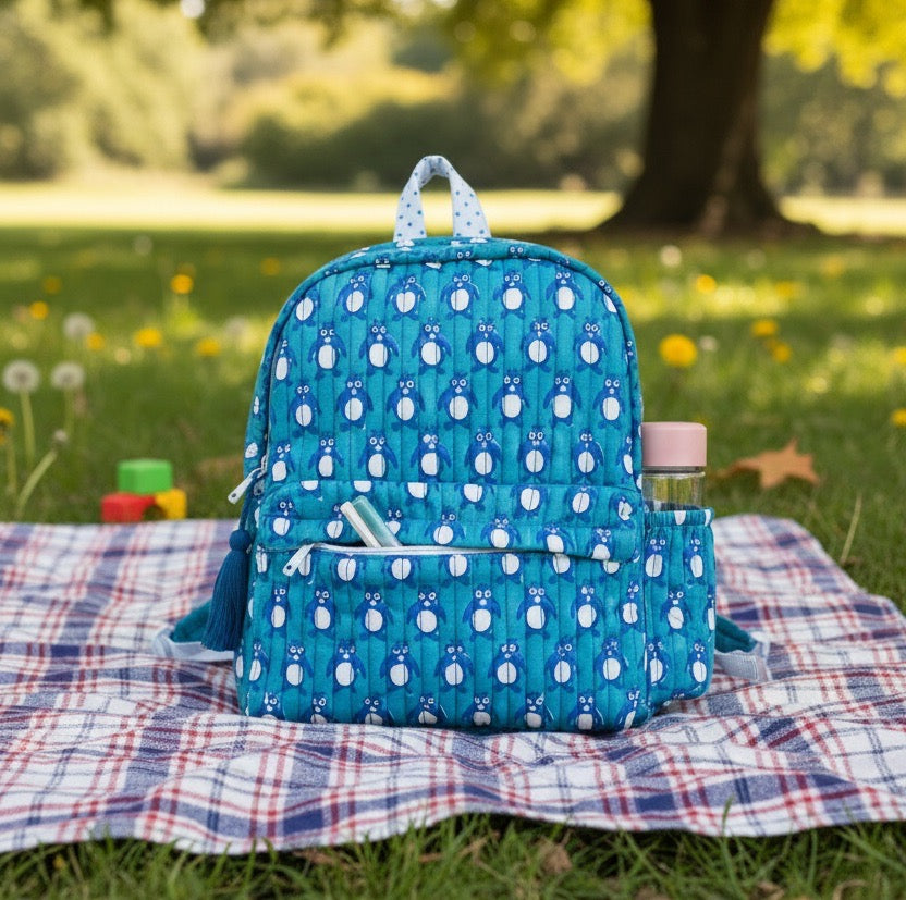 Penguin print hand block-printed cotton kids backpack – 3/4 studio angle