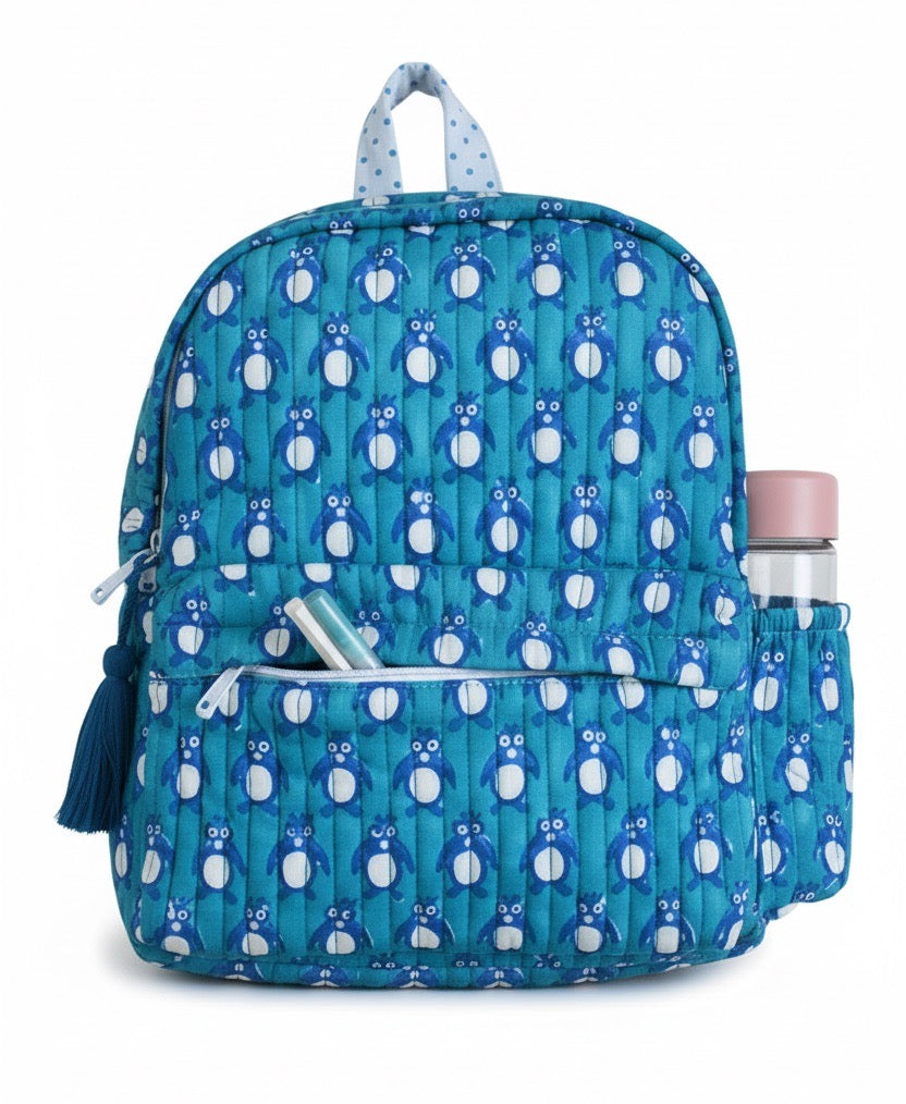 Penguin print hand block-printed cotton kids backpack – flat front, studio