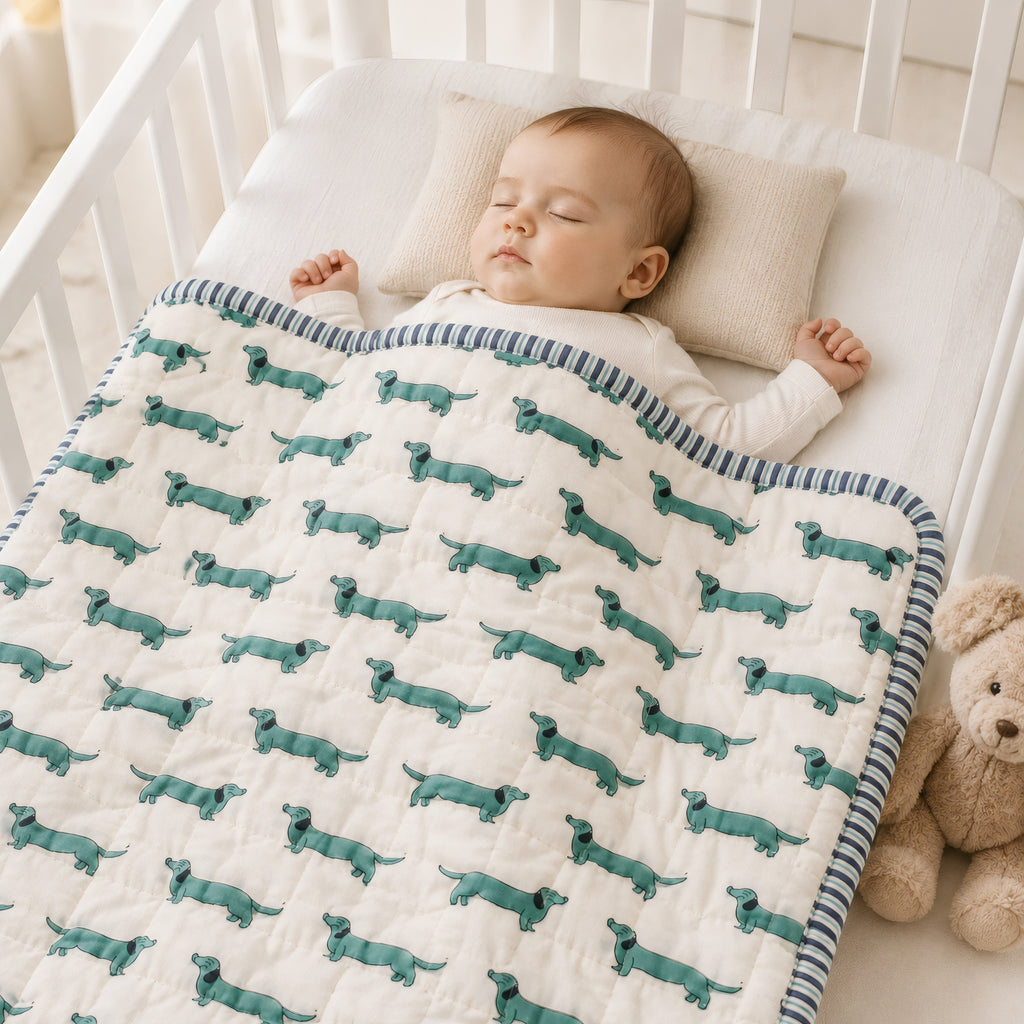 PEXX green dachshund print reversible cotton baby quilt, 100 x 100 cm — baby nap lifestyle