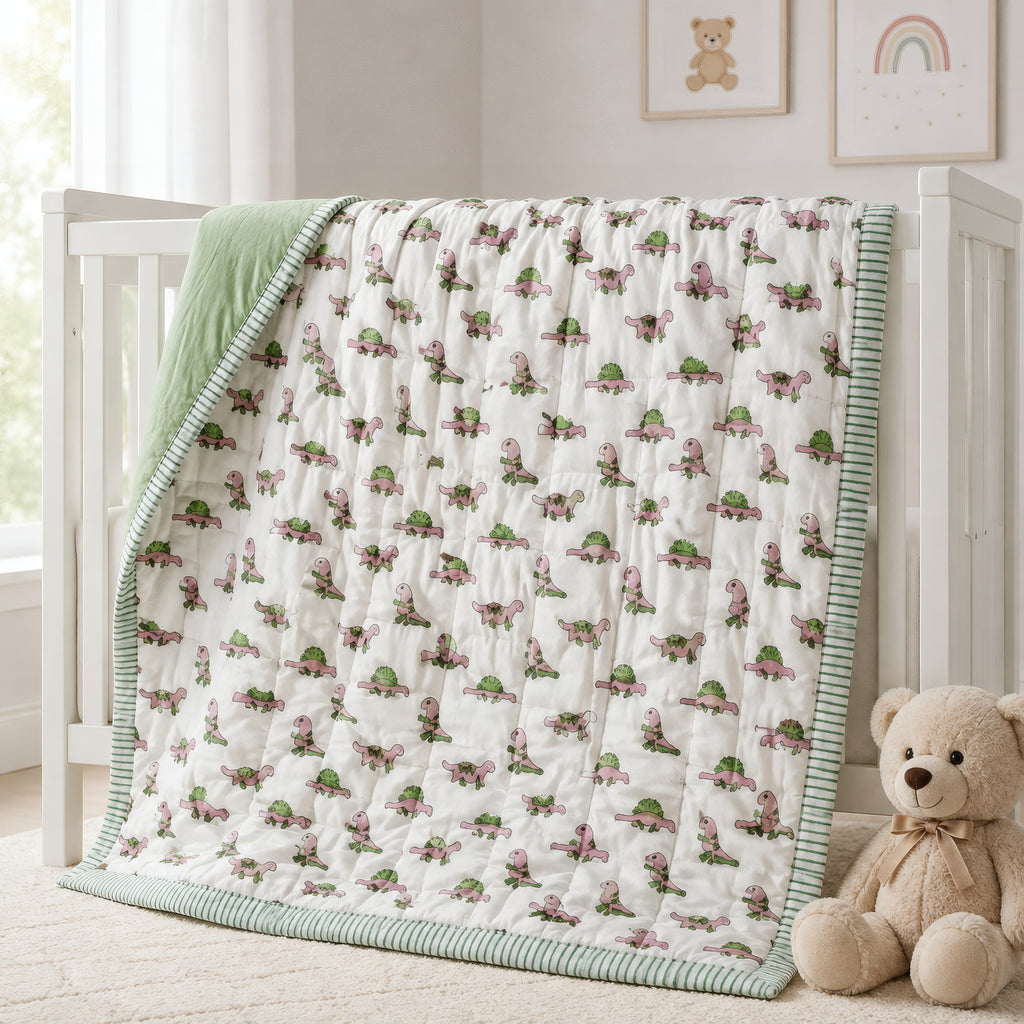 PEXX pink dino print reversible cotton baby quilt, 100 x 100 cm — nursery display