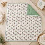 PEXX pink dino print reversible cotton baby quilt, 100 x 100 cm — hero full quilt