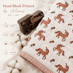 PEXX terracotta unicorn print reversible cotton baby quilt, 100 x 100 cm — hero full quilt