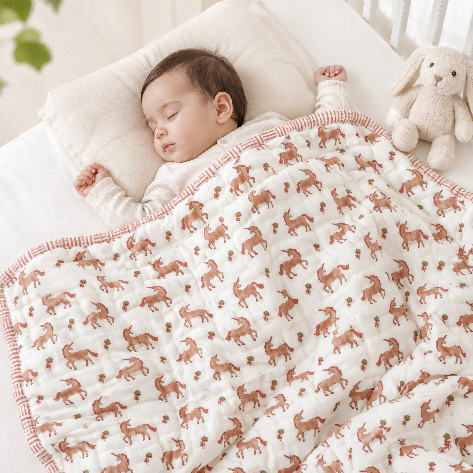 PEXX terracotta unicorn print reversible cotton baby quilt, 100 x 100 cm — baby nap lifestyle