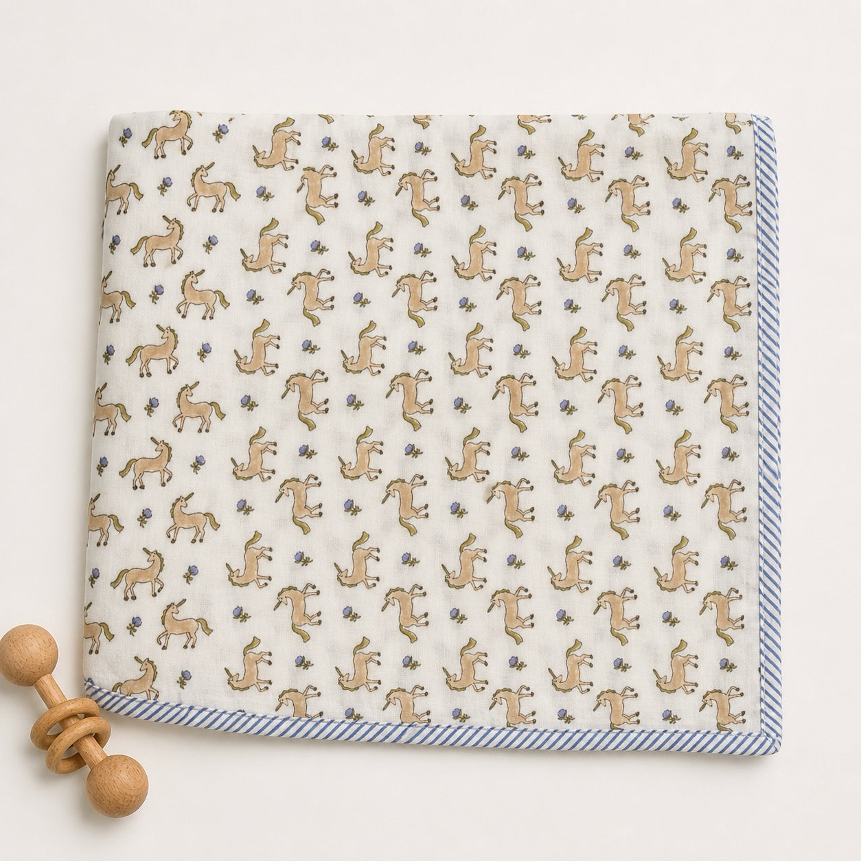 Unicorn & Dolphin print hand block-printed cotton muslin baby swaddle set – print A flat lay