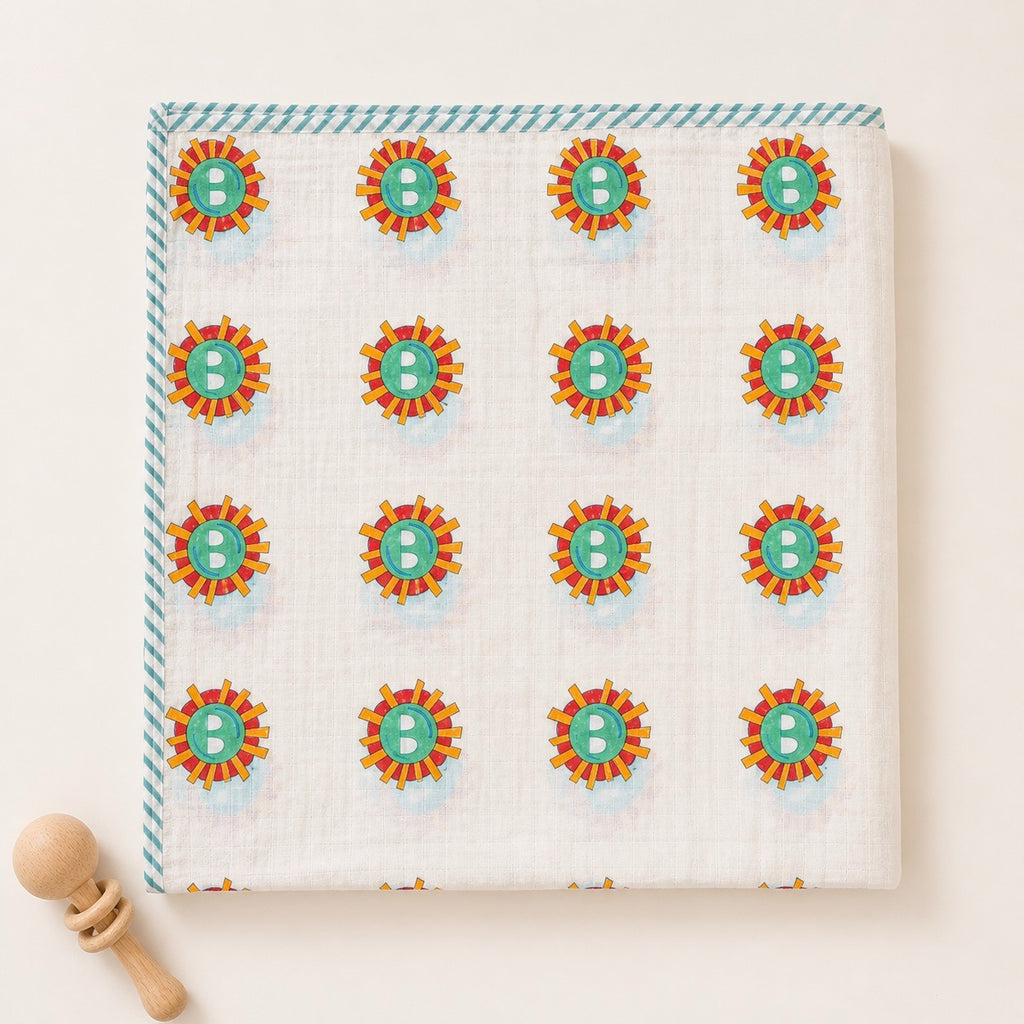 Sunburst & Polka Dot print hand block-printed cotton muslin baby swaddle set – print A flat lay