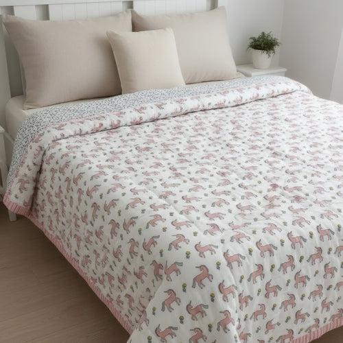 Blush Pony print hand block-printed reversible cotton voile kids quilt (razai) – hero/folded