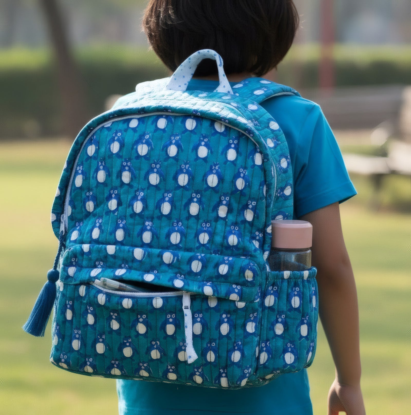 Penguin print hand block-printed cotton kids backpack – hero/worn