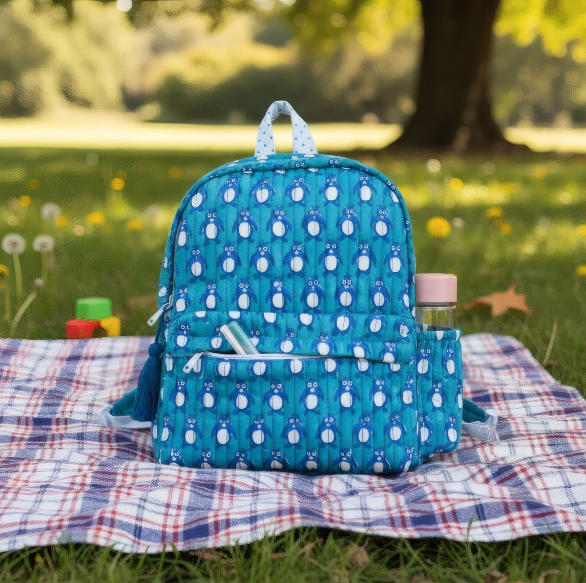 Penguin print hand block-printed cotton kids backpack – 3/4 studio angle
