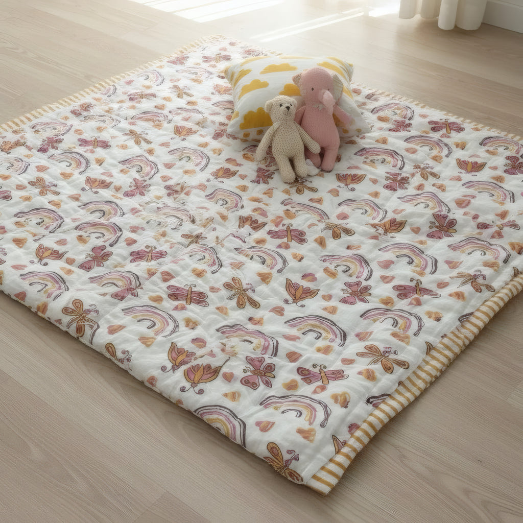 Rainbow Meadow print hand block-printed reversible cotton voile kids quilt (razai) – lifestyle - bed
