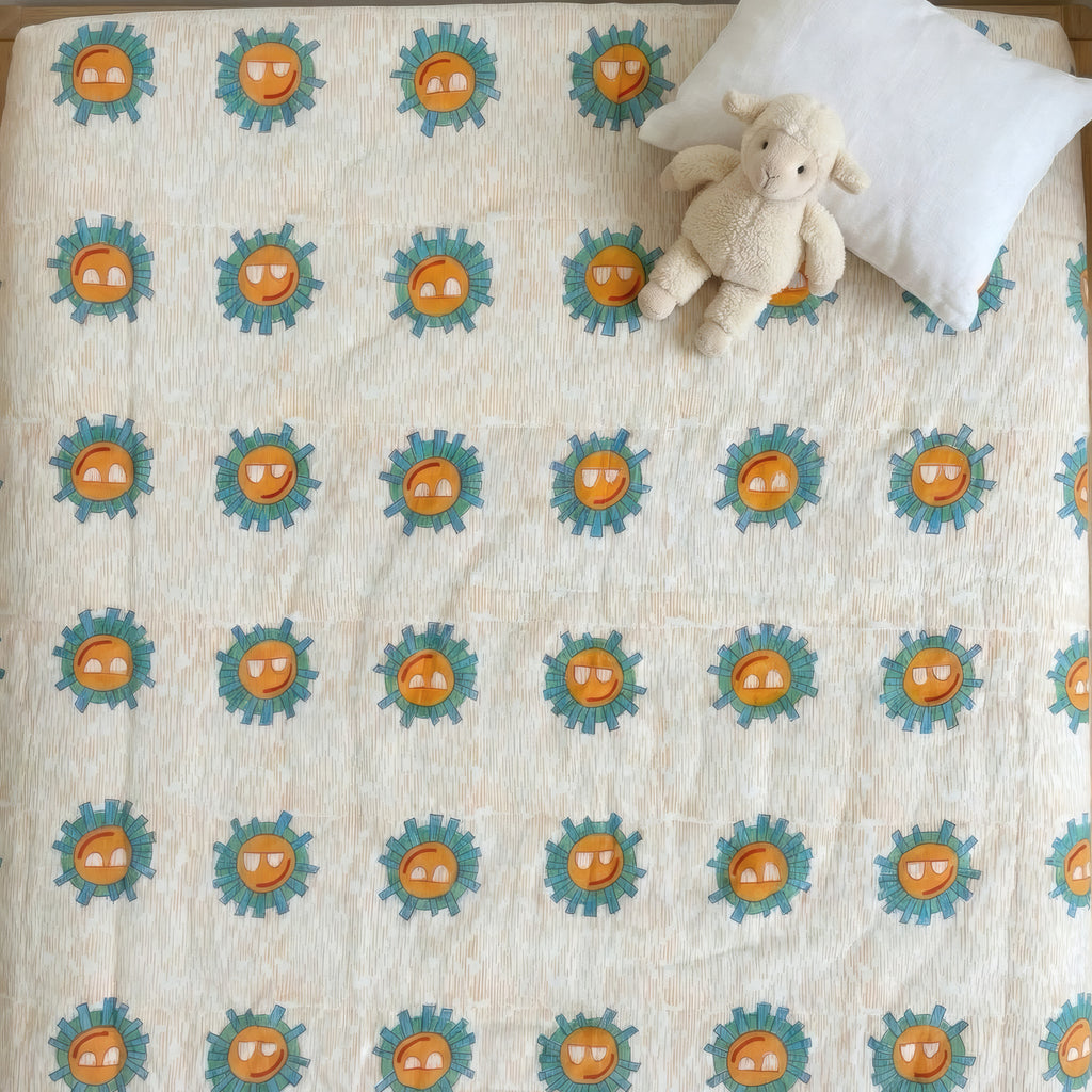 Sunshine print hand block-printed reversible cotton voile kids quilt (razai) – hero/folded