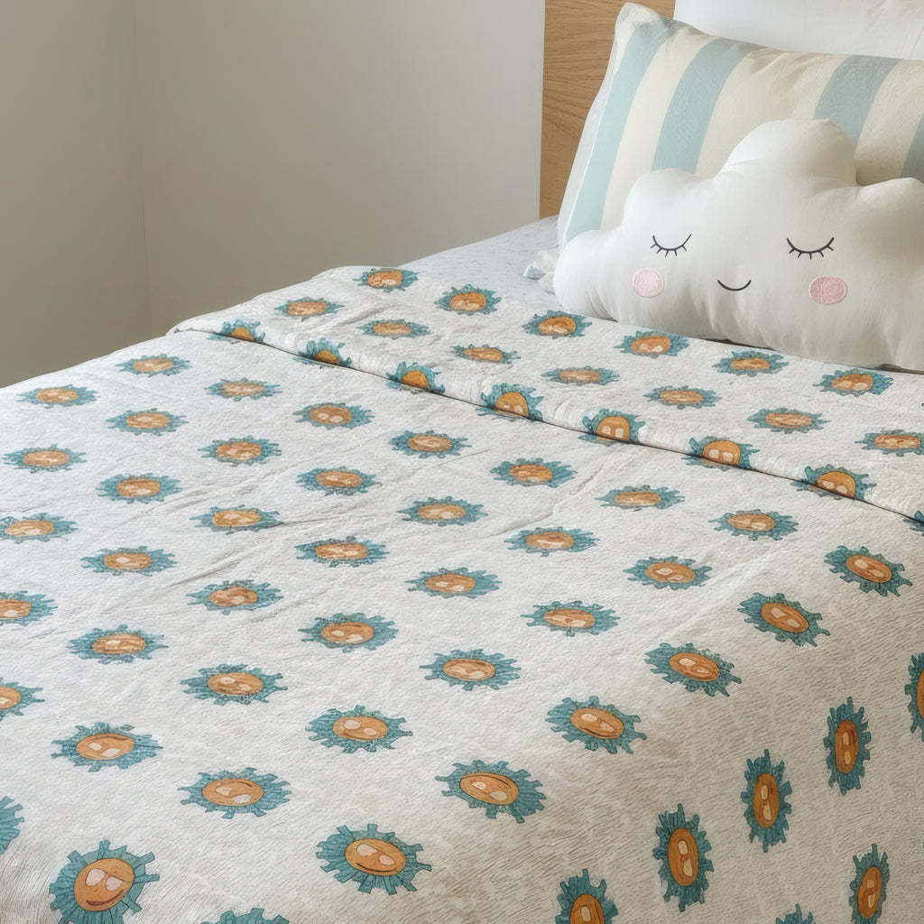Sunshine print hand block-printed reversible cotton voile kids quilt (razai) – print detail close-up