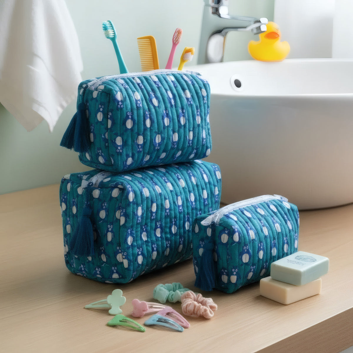 Teal Penguin print hand block-printed cotton toiletry pouch set